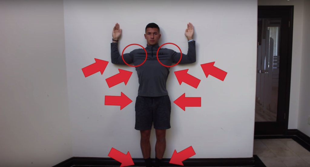 Wall-slides to correct rounded shoulders