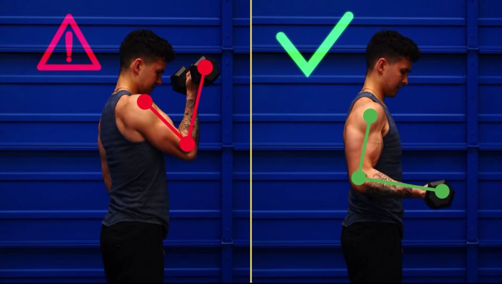 Keep your elbow locked by your side as you perform the standing dumbbell bicep curl