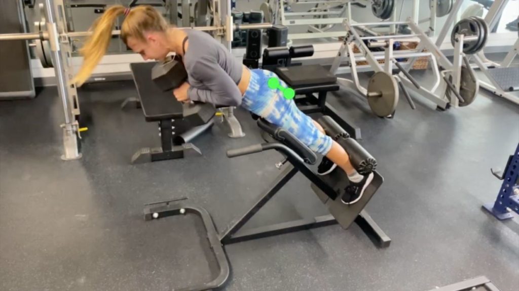 Squeeze your butt hard to bring the 2 points together during the hip extension