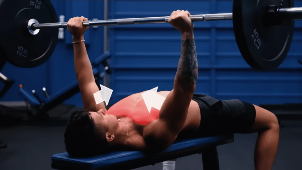 Think about squeezing your biceps together on the ascent of the bench press